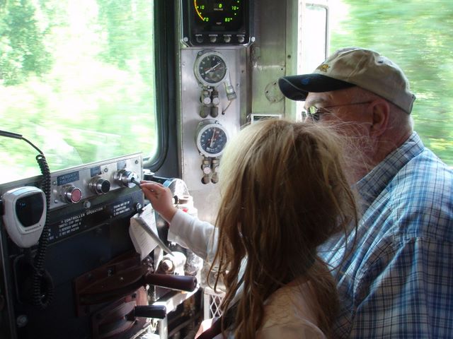 Danielle Blowing the Whistle on the Flag Stop Train