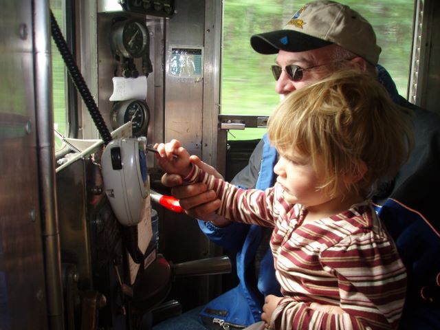Cassidy Blowing the Whistle on the Talkeetna Flag Stop Train.